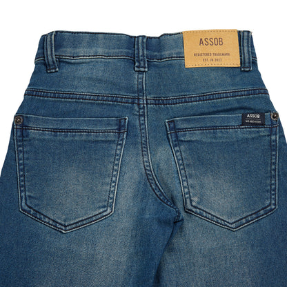 Assob kids Straight Jean, a classic mid-wash blue denim pant designed with a standard 5-pocket layout and localized light thigh fading.