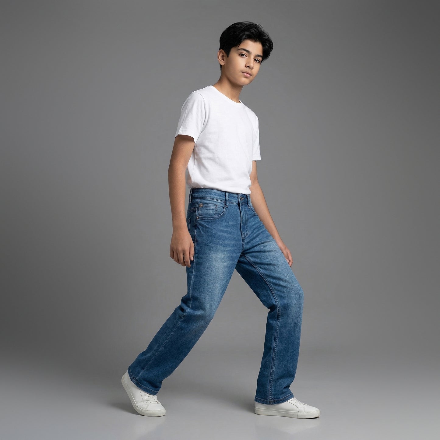 Assob kids Straight Jean, a classic mid-wash blue denim pant designed with a standard 5-pocket layout and localized light thigh fading.